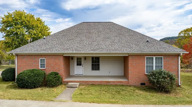 a view of a house with a mountain