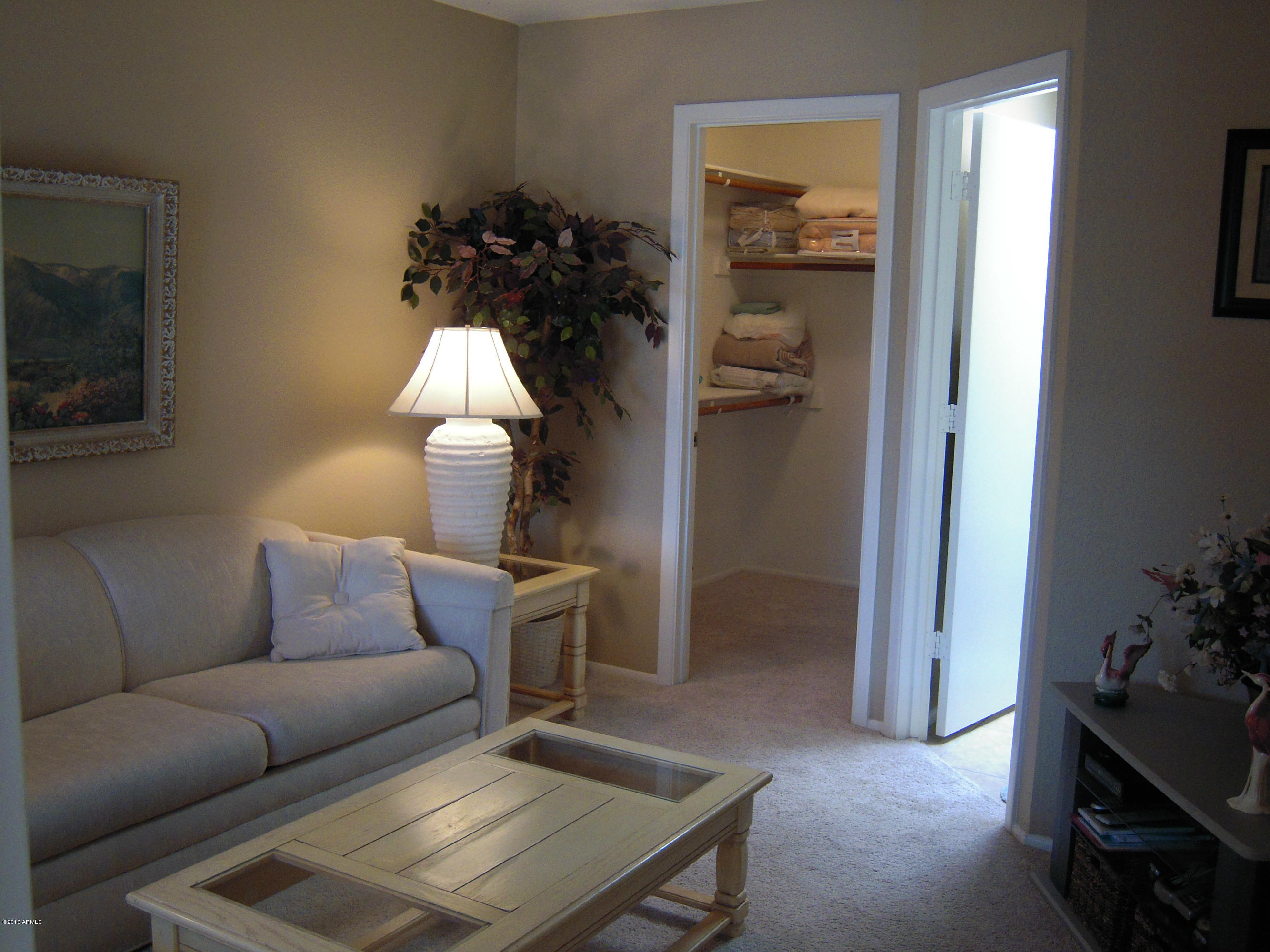 14300 West Bell Road, Unit 229 Surprise, AZ 85374 - Photo 9 of 15 2nd bedroom closet & bathroom