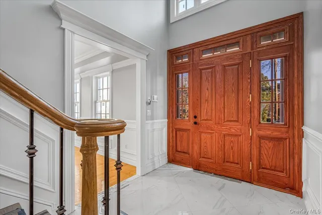 a view of entryway with a front door