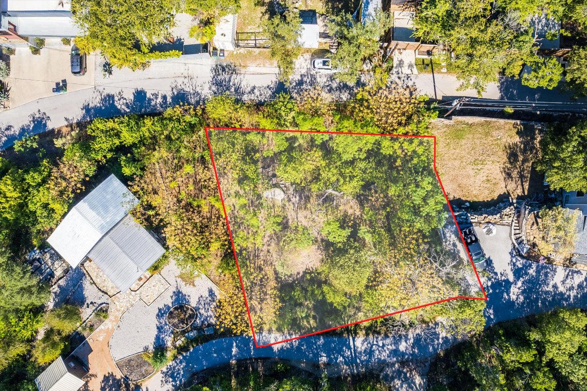 16200 Aqua Azul Path Austin, TX 78734 - Photo 1 of 11 a aerial view of a house with a yard and garden