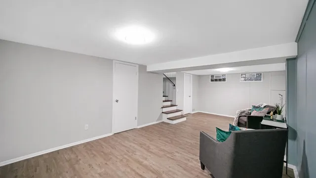 a view of workspace with wooden floor