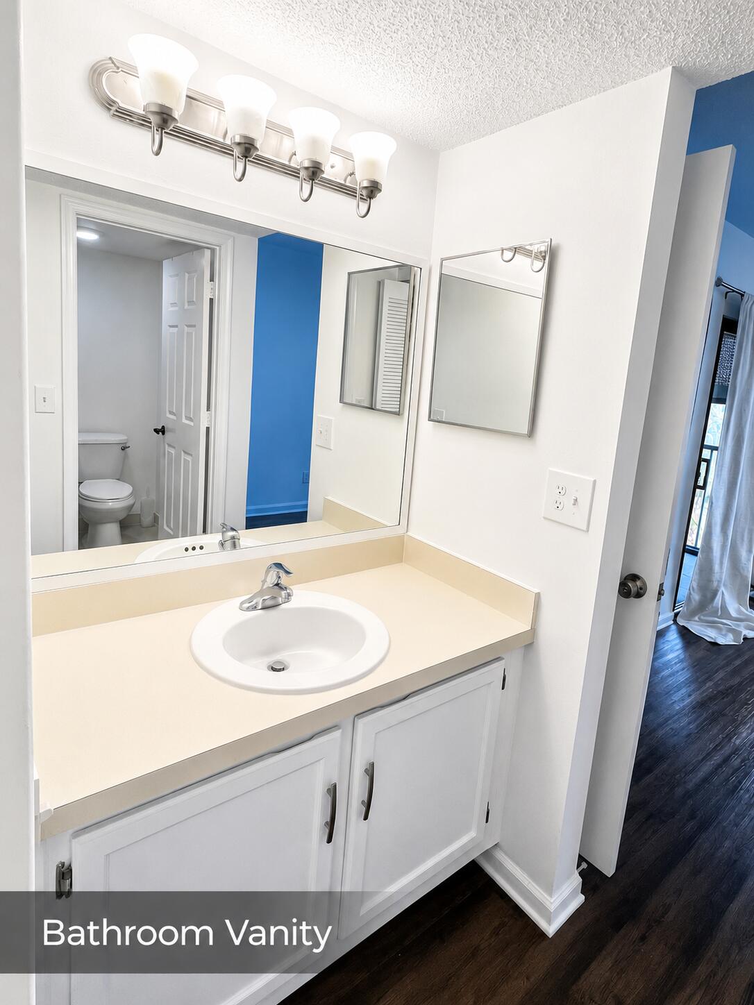 2650 Greenwood Terrace, Unit 2230 Boca Raton, FL 33431 - Photo 14 of 21 a bathroom with a sink and a mirror