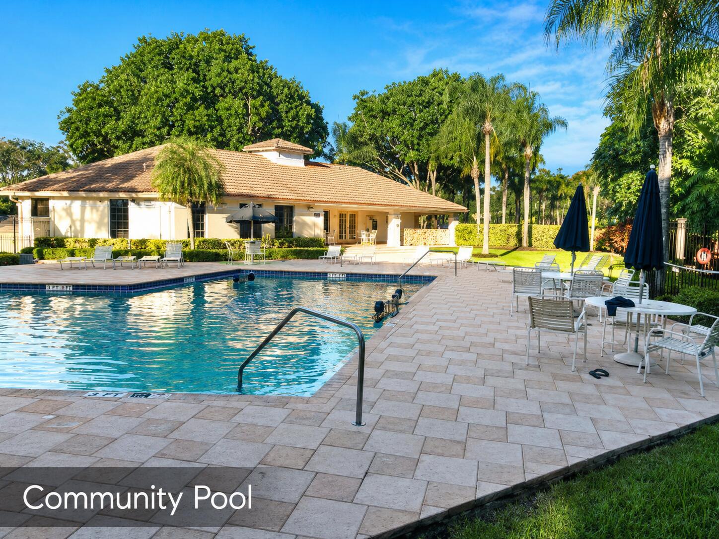 2650 Greenwood Terrace, Unit 2230 Boca Raton, FL 33431 - Photo 17 of 21 a view of house with garden and swimming pool