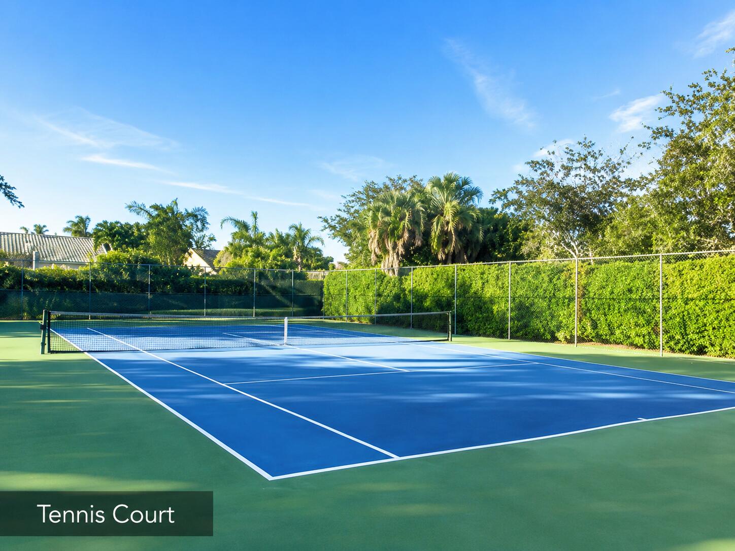 2650 Greenwood Terrace, Unit 2230 Boca Raton, FL 33431 - Photo 20 of 21 a view of a tennis court
