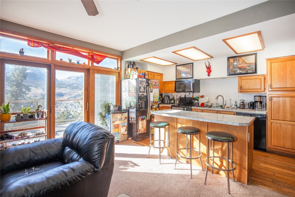 97 Rd G Silverthorne, CO 80498 - Photo 6 of 26 a living room with furniture and a large window