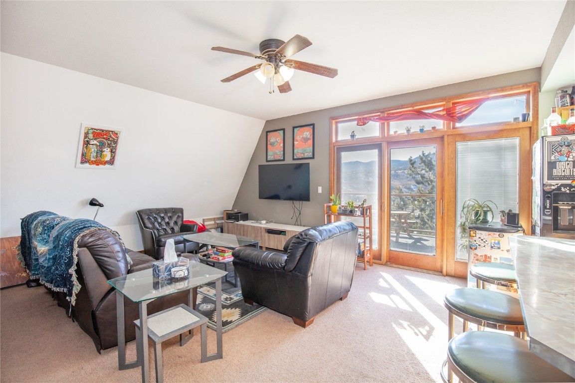 97 Rd G Silverthorne, CO 80498 - Photo 8 of 26 a living room with furniture and a large window