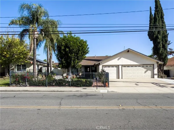 a view of a house and a street