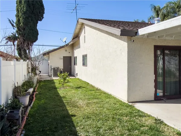 a view of a house with a patio