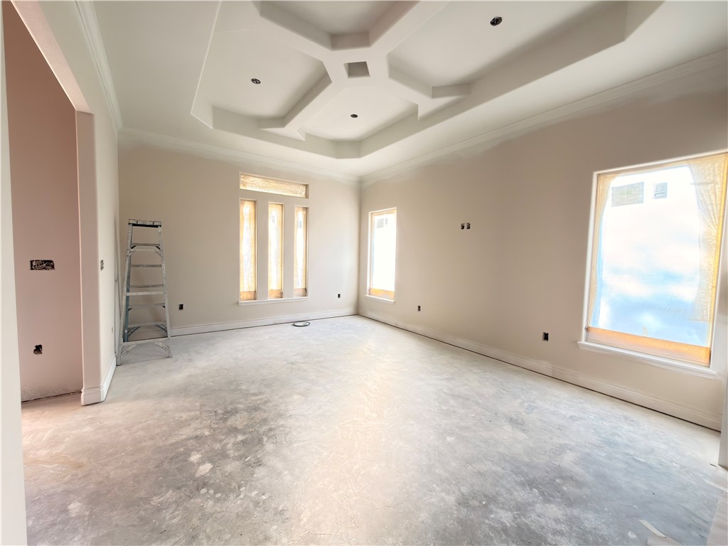 2602 Milo Street Corpus Christi, TX 78415 - Photo 3 of 14 an empty room with windows and fan