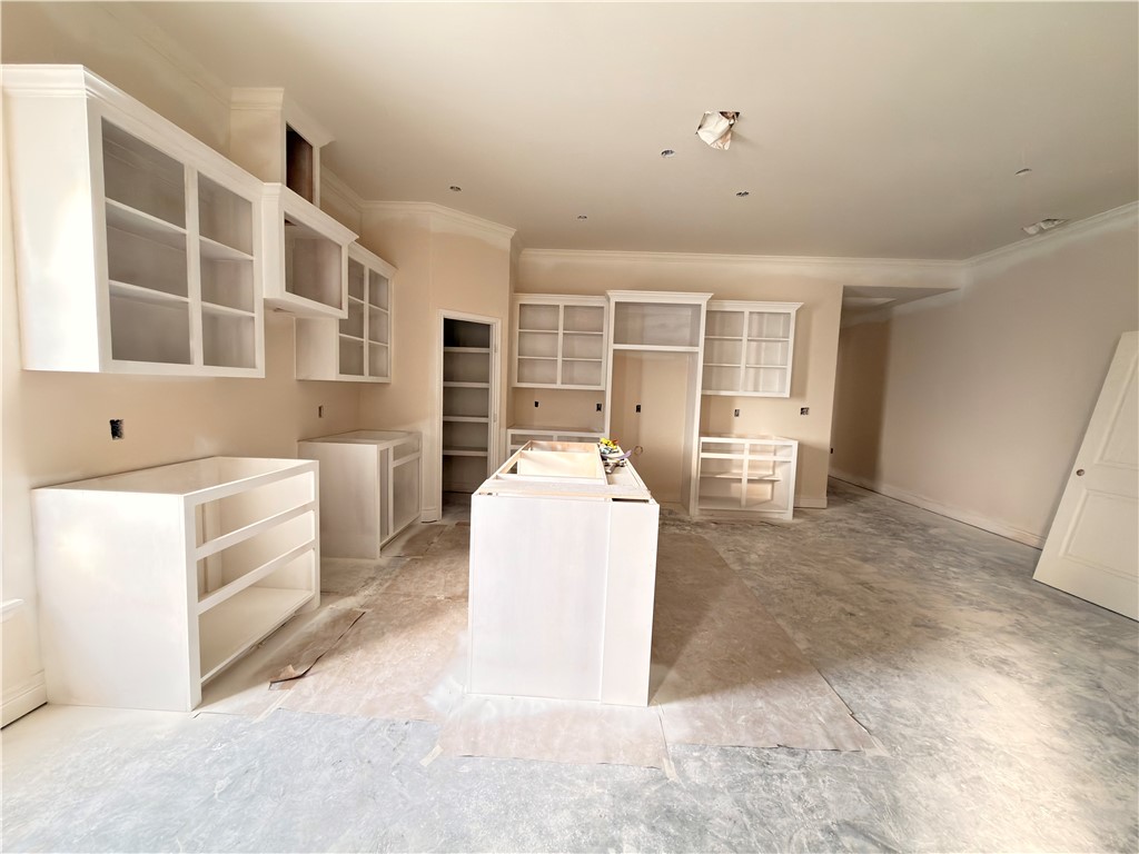 2602 Milo Street Corpus Christi, TX 78415 - Photo 5 of 14 a living room with furniture and large windows