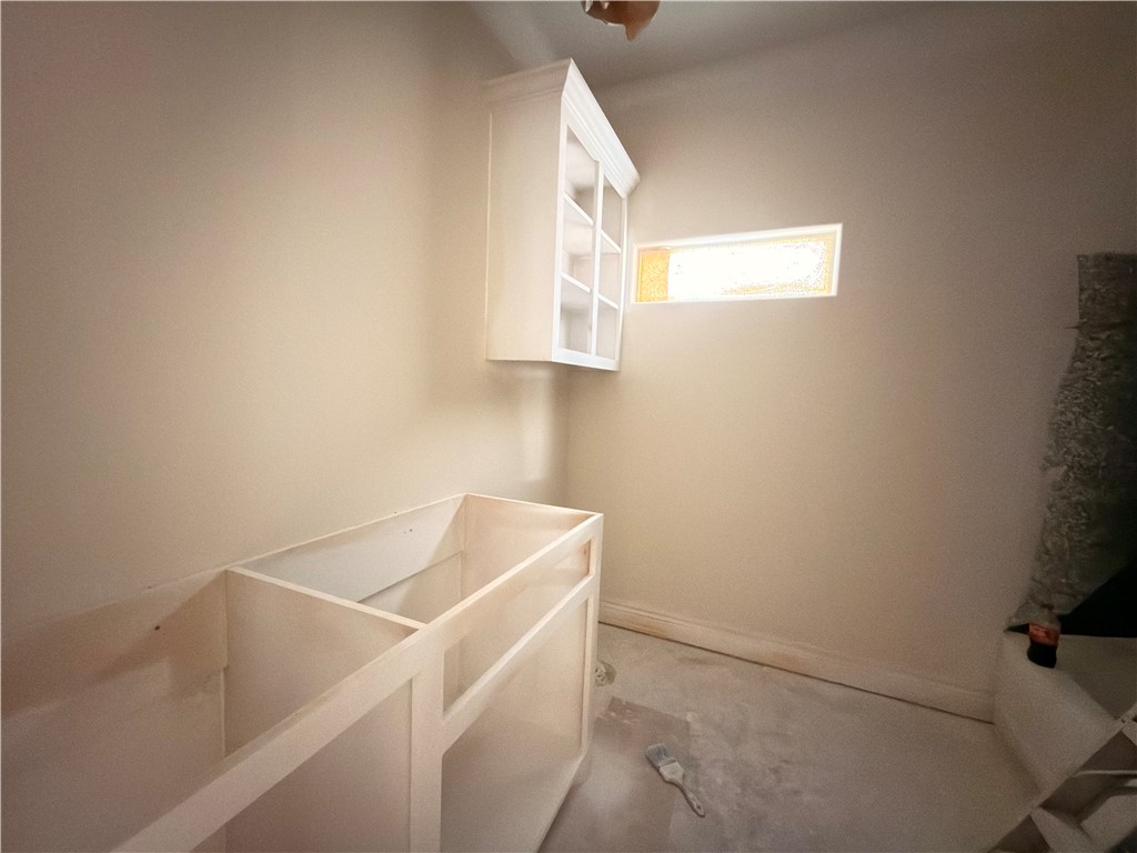 2602 Milo Street Corpus Christi, TX 78415 - Photo 7 of 14 a utility room with dryer and washer
