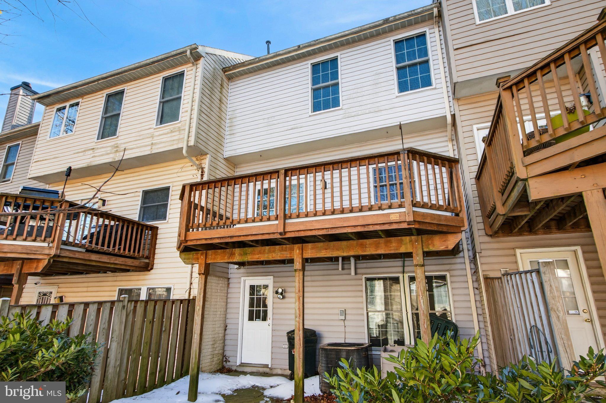 9963 Sherwood Farm Road Owings Mills, MD 21117 - Photo 18 of 48 a front view of a house with a balcony
