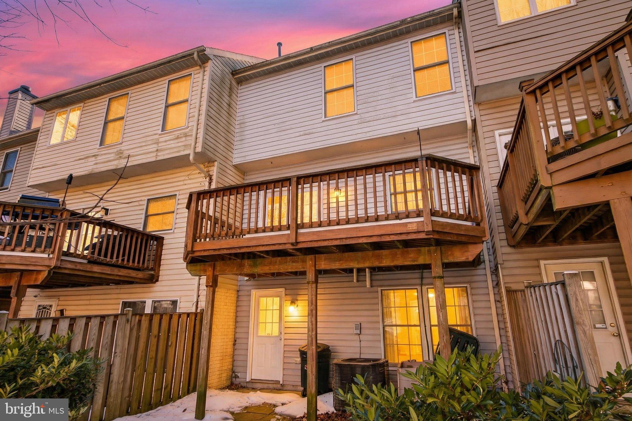9963 Sherwood Farm Road Owings Mills, MD 21117 - Photo 20 of 48 a front view of a house with a garden
