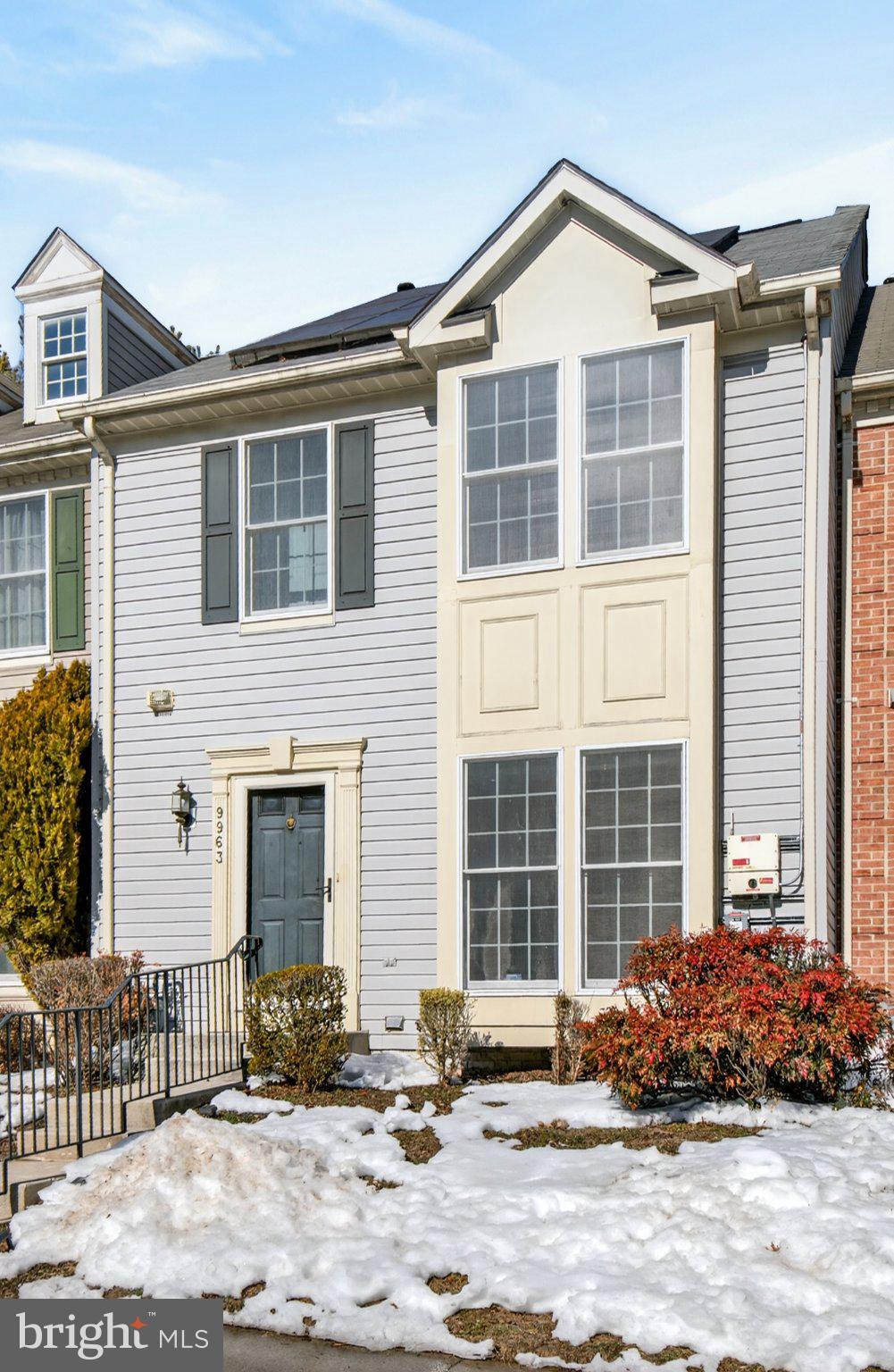 9963 Sherwood Farm Road Owings Mills, MD 21117 - Photo 2 of 48 a front view of a house with a yard