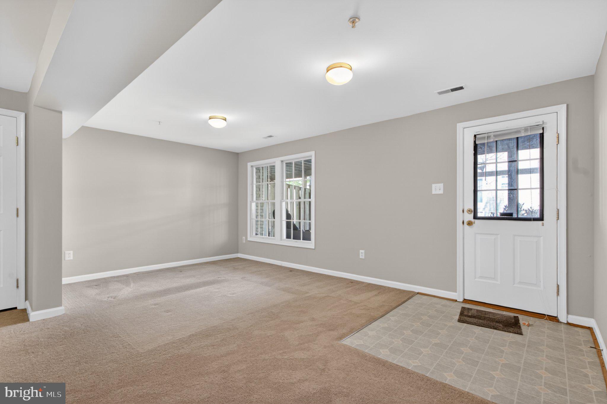9963 Sherwood Farm Road Owings Mills, MD 21117 - Photo 25 of 48 an empty room with windows