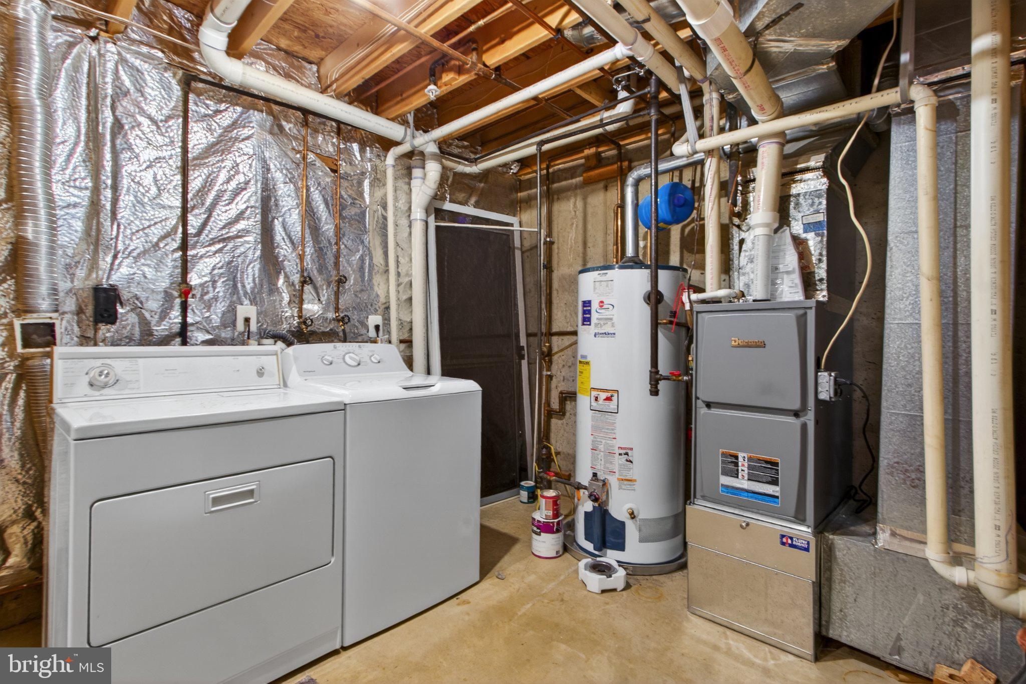9963 Sherwood Farm Road Owings Mills, MD 21117 - Photo 26 of 48 a room with storage and utility
