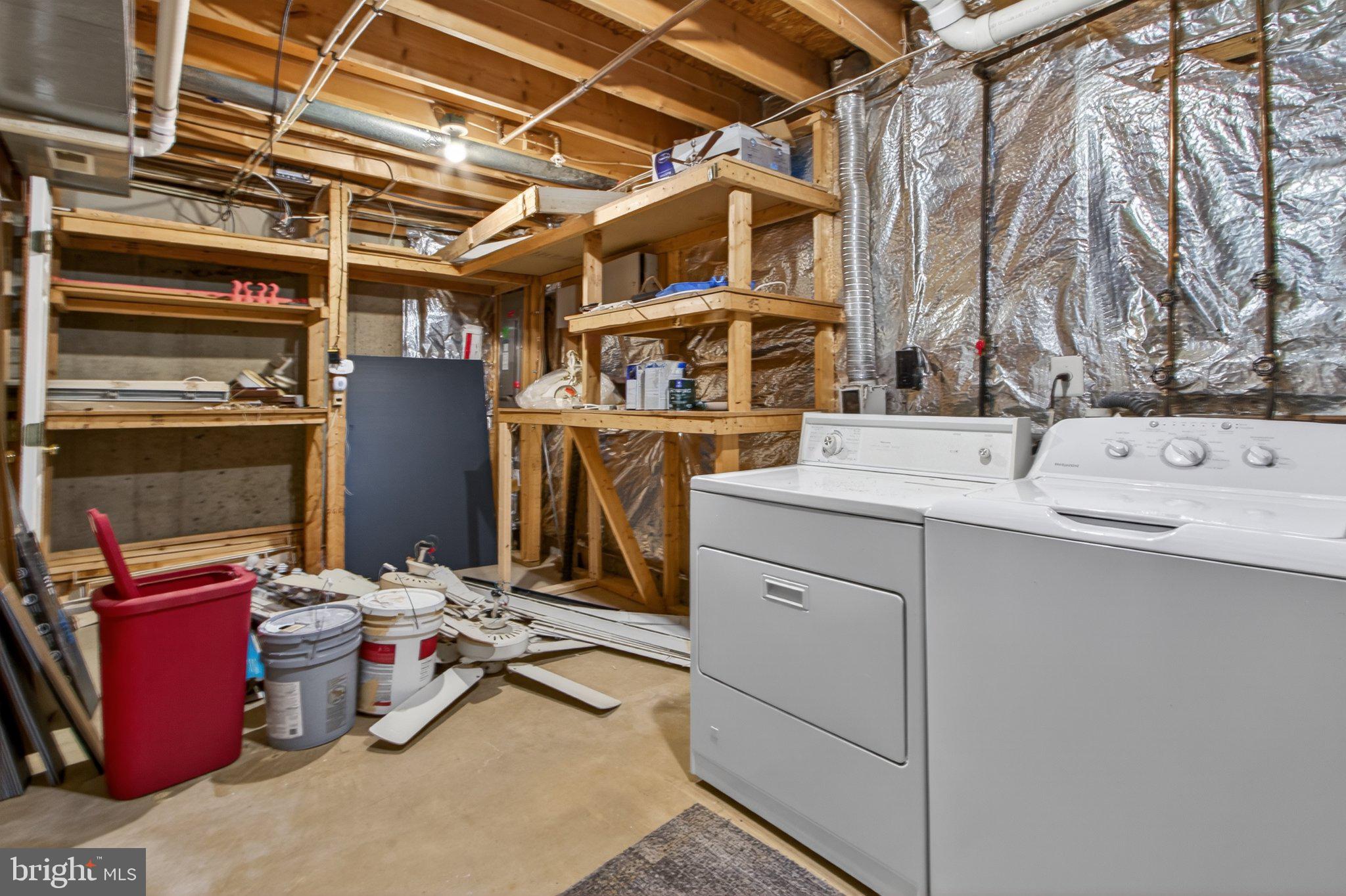 9963 Sherwood Farm Road Owings Mills, MD 21117 - Photo 27 of 48 a utility room with dryer and washer