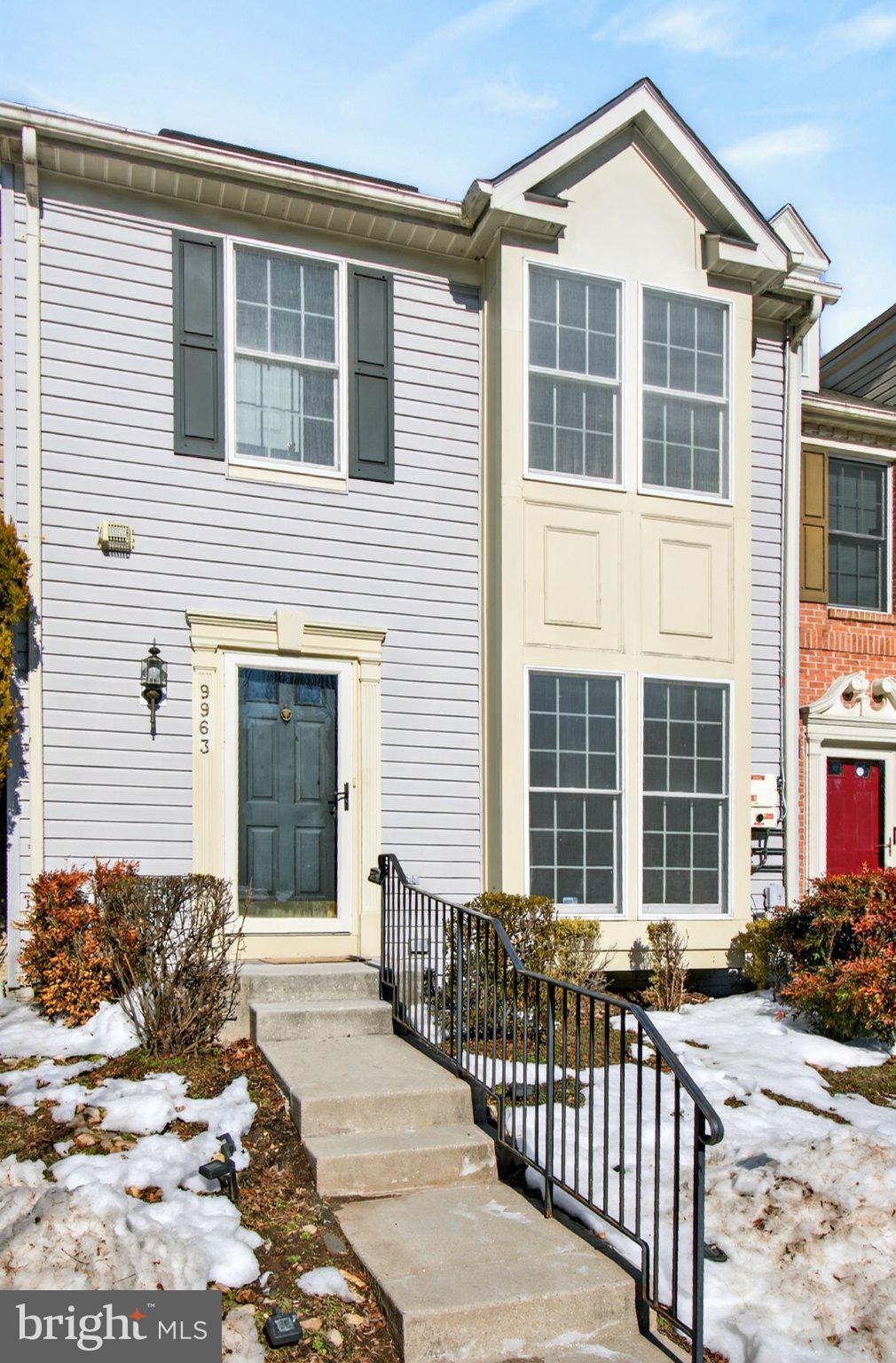 9963 Sherwood Farm Road Owings Mills, MD 21117 - Photo 3 of 48 a front view of a house with a yard
