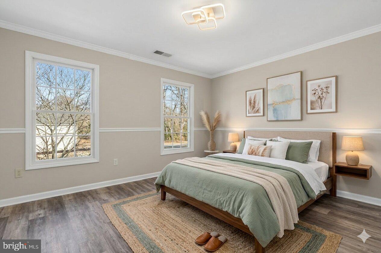 9963 Sherwood Farm Road Owings Mills, MD 21117 - Photo 36 of 48 a bedroom with a bed and a window
