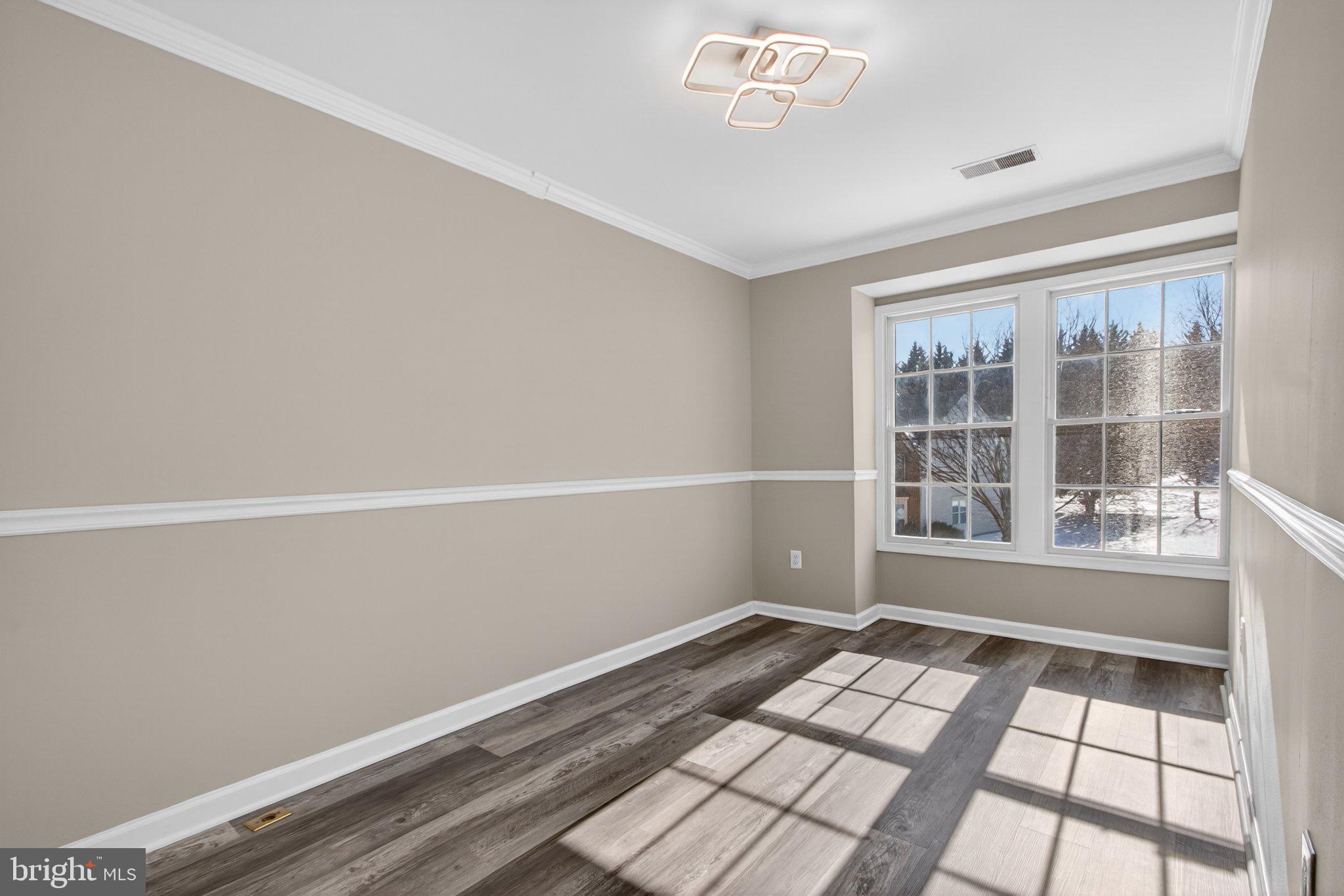 9963 Sherwood Farm Road Owings Mills, MD 21117 - Photo 40 of 48 a view of an empty room with a window