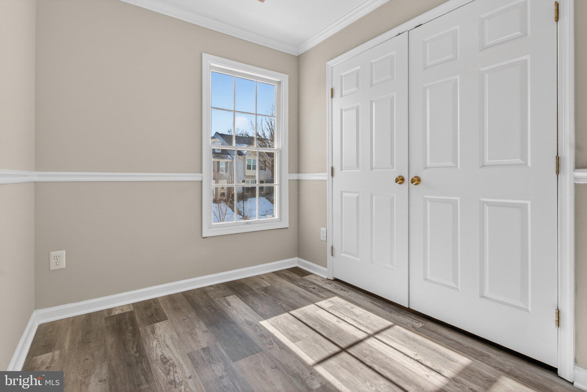 9963 Sherwood Farm Road Owings Mills, MD 21117 - Photo 45 of 48 a view of an empty room with closet and a window