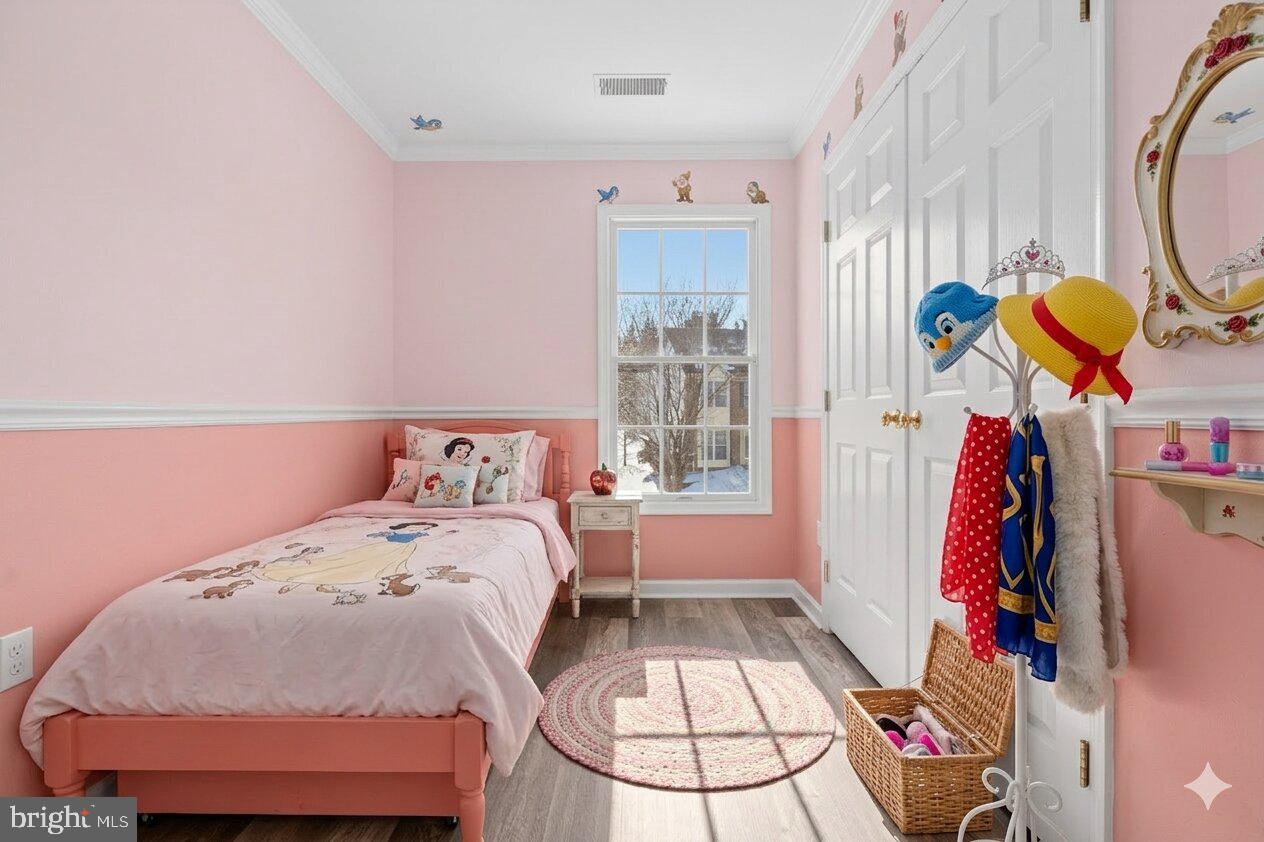 9963 Sherwood Farm Road Owings Mills, MD 21117 - Photo 47 of 48 a bedroom with a bed and a window