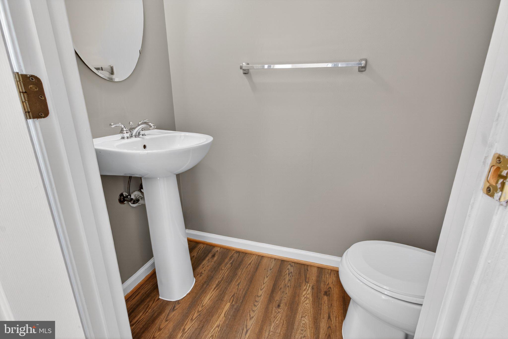 9963 Sherwood Farm Road Owings Mills, MD 21117 - Photo 10 of 48 a bathroom with a sink toilet and shower