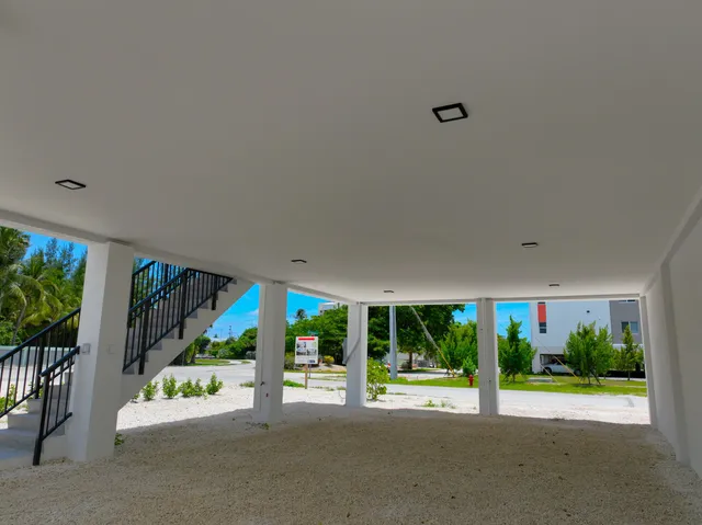 a view of a patio with a garden