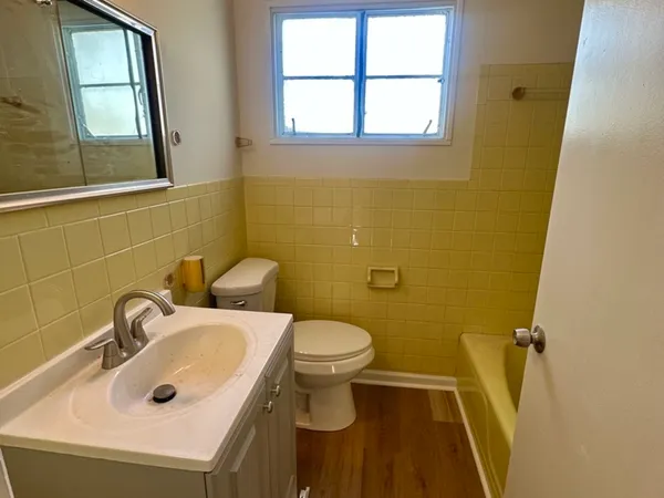 a bathroom with a sink and a toilet