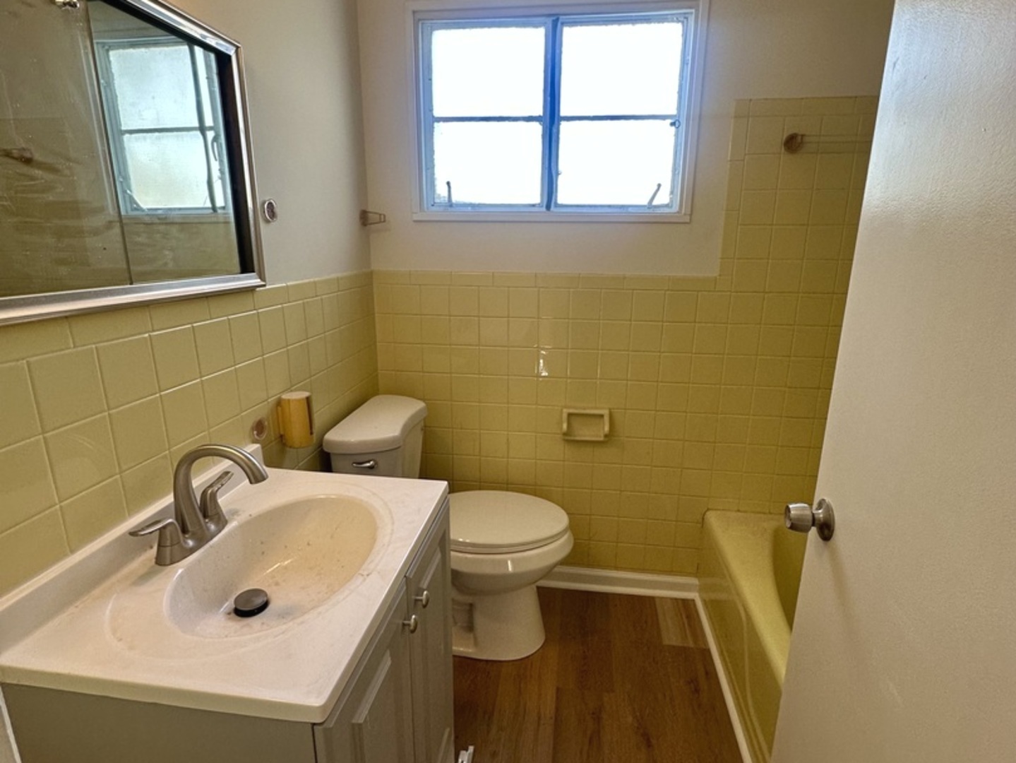 2156 Downey Road Homewood, IL 60430 - Photo 13 of 18 a bathroom with a sink and a toilet