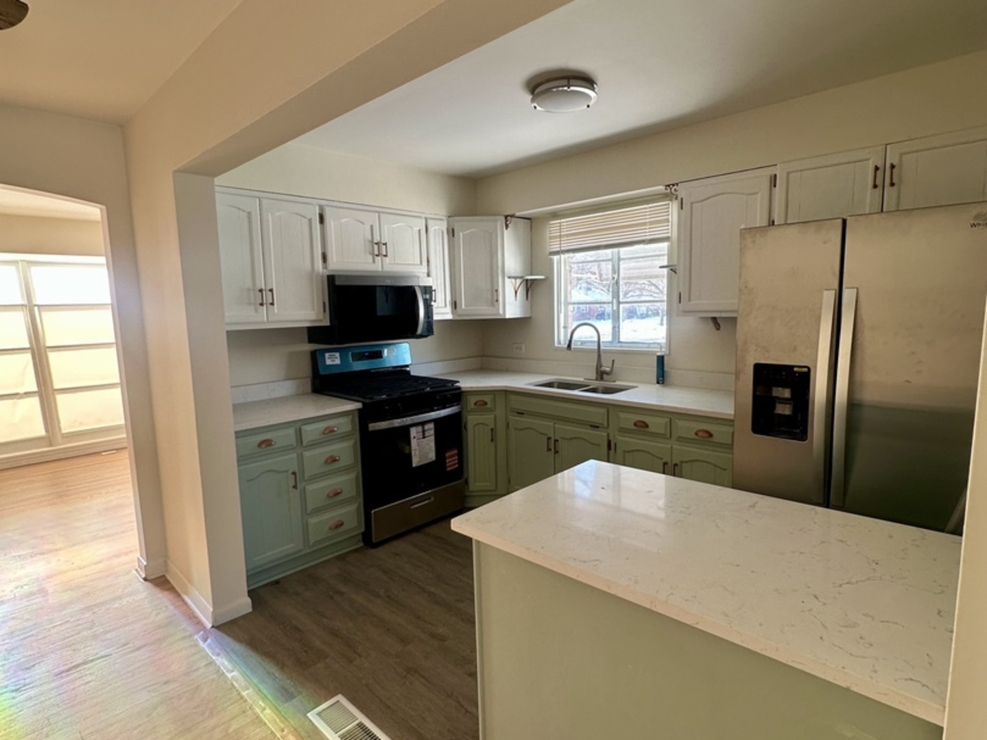 2156 Downey Road Homewood, IL 60430 - Photo 3 of 18 a kitchen with granite countertop a refrigerator stove top oven and sink