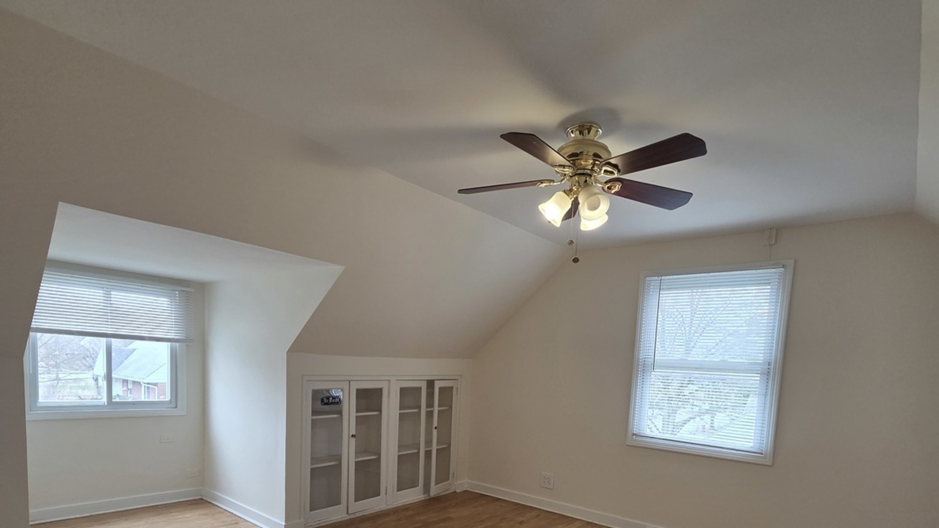 2156 Downey Road Homewood, IL 60430 - Photo 9 of 17 a a ceiling fan with window and ceiling fan