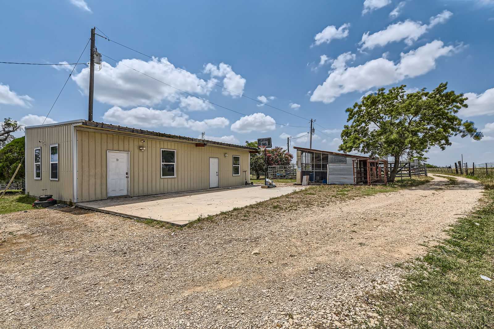 480 Grandpa Road Lockhart, TX 78644 - Photo 27 of 35 back of the workshop where there are two studio apartments