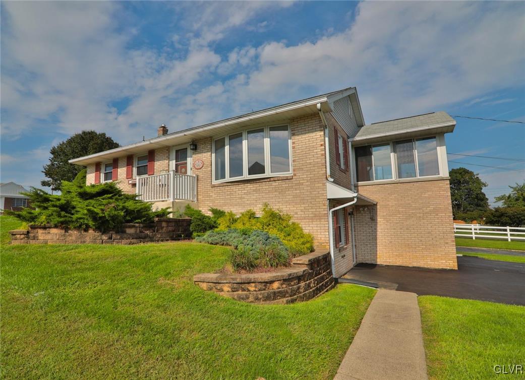 403 Keystone Avenue Emmaus, PA 18049 - Photo 1 of 29 a front view of a house with garden