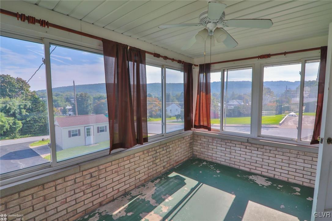 403 Keystone Avenue Emmaus, PA 18049 - Photo 12 of 29 a view of a porch with wooden floor and outdoor space