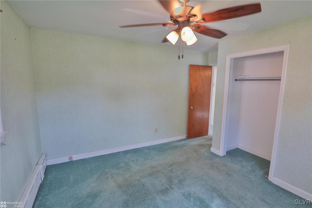 403 Keystone Avenue Emmaus, PA 18049 - Photo 18 of 29 an empty room with a fan and a fan
