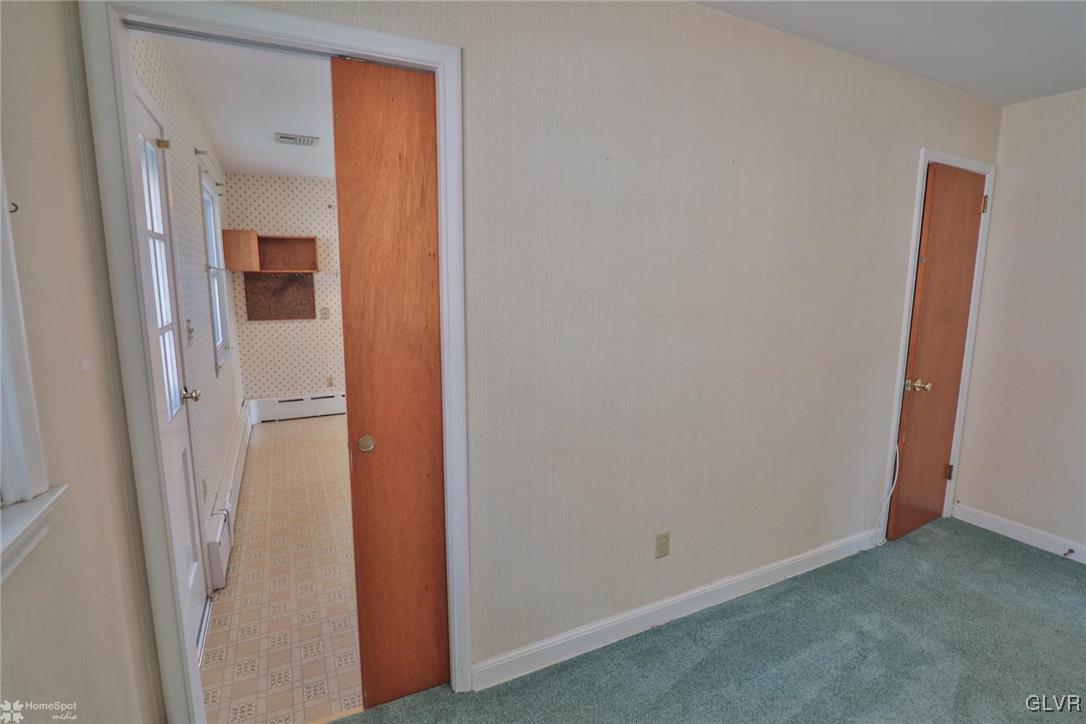 403 Keystone Avenue Emmaus, PA 18049 - Photo 19 of 29 a view of hallway with closet and mirror