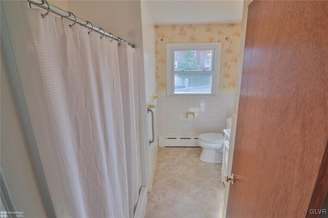 403 Keystone Avenue Emmaus, PA 18049 - Photo 20 of 29 a bathroom with a shower and a toilet