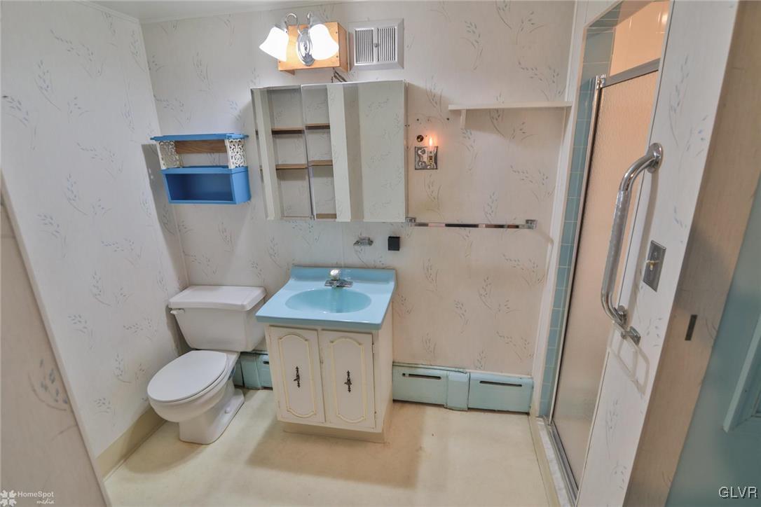403 Keystone Avenue Emmaus, PA 18049 - Photo 25 of 29 a bathroom with a sink a toilet and shower