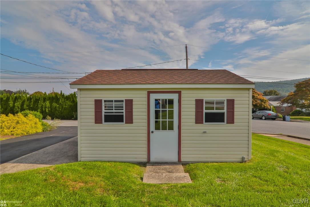 403 Keystone Avenue Emmaus, PA 18049 - Photo 28 of 29 a front view of house with yard and garage