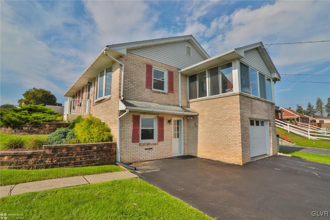 403 Keystone Avenue Emmaus, PA 18049 - Photo 7 of 29 a front view of a house with a yard