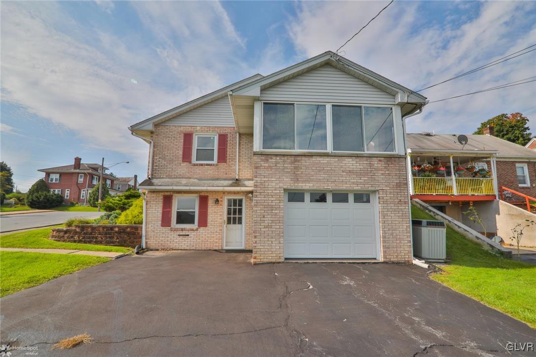403 Keystone Avenue Emmaus, PA 18049 - Photo 8 of 29 a front view of a house with a yard