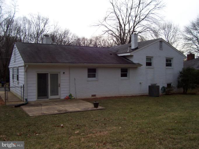5636 Heming Avenue Springfield, VA 22151 - Photo 14 of 30 a view of a house with a yard and garage