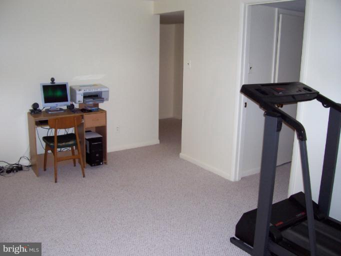 5636 Heming Avenue Springfield, VA 22151 - Photo 20 of 30 a view of a workspace with furniture and a window