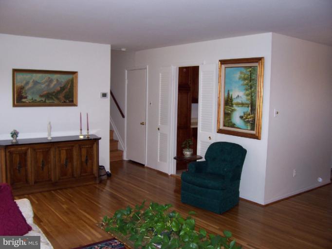 5636 Heming Avenue Springfield, VA 22151 - Photo 3 of 30 a living room with furniture and a wooden floor