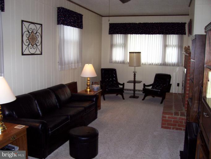 5636 Heming Avenue Springfield, VA 22151 - Photo 25 of 30 a living room with furniture and a large window