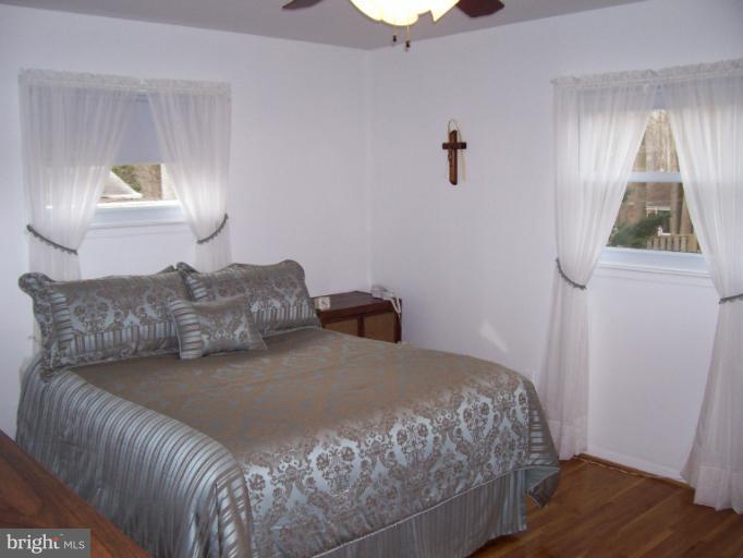 5636 Heming Avenue Springfield, VA 22151 - Photo 6 of 30 a bedroom with a bed and a window