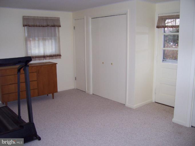 5636 Heming Avenue Springfield, VA 22151 - Photo 7 of 30 a view of an empty room and closet area