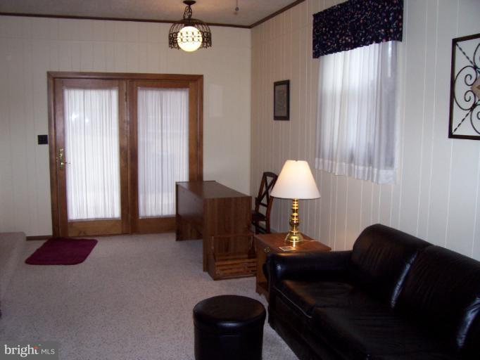 5636 Heming Avenue Springfield, VA 22151 - Photo 10 of 30 a living room with furniture and a window
