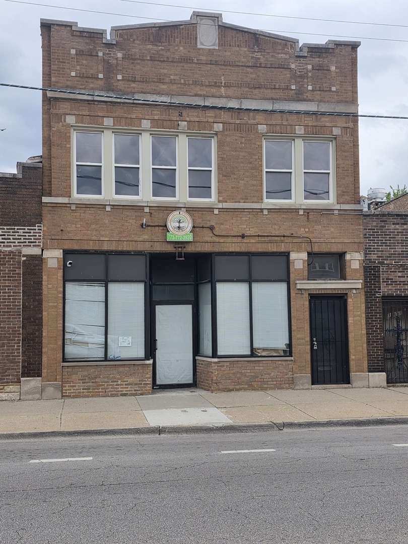 1853 East 79th Street, Unit 2 Chicago, IL 60649 - Photo 1 of 14 a view of a building with a window